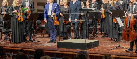 Sergejs Dogadins un Ilonas Breģes simfonijas pirmatskaņojums,foto: Jānis Vecbrālis